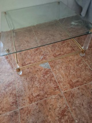Mesa de centro cristal y metal dorado
