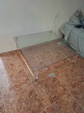 Mesa de centro cristal y metal dorado