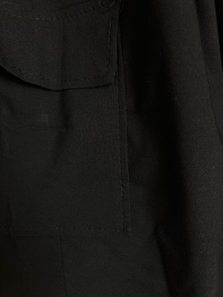 Pantalón bombacho negro con cinturón
