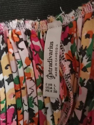 Pantalón palazzo plisado floral Stradivarius