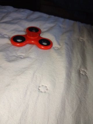 Spinner rojo como nuevo