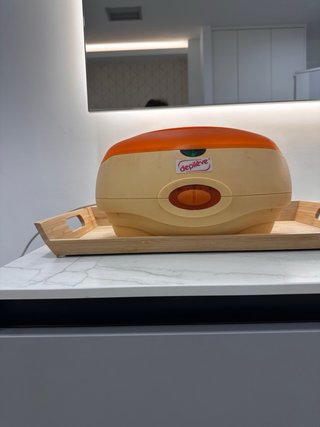 Fundidor de parafina Depiléve naranja y beige