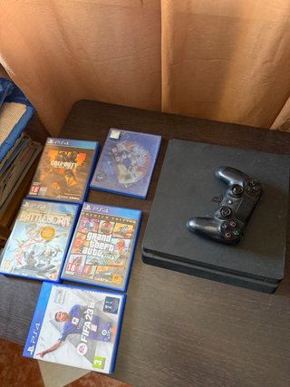 PS4 Slim Negra + Mando y 5 Juegos