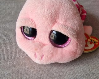 Peluche tartaruga rosa con macchie