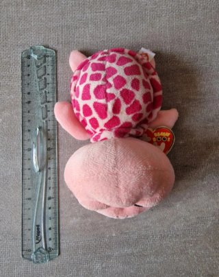 Peluche tartaruga rosa con macchie