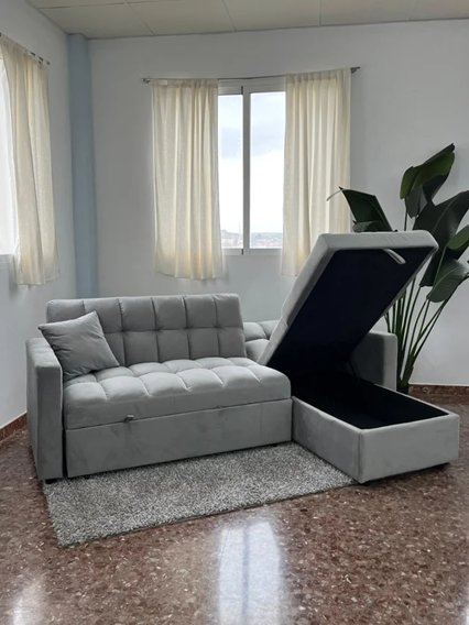 Divano letto grigio in velluto nuovo nella sua scatola