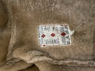 Chaqueta de pelo beige y marrón