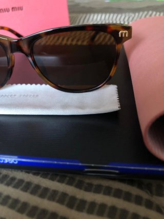 Óculos de Sol Miu Miu