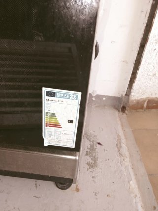 Cocina de gas con horno eléctrico marca Meireles