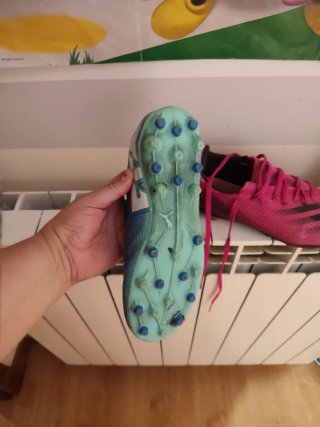 Botas de fútbol Puma azules y verdes