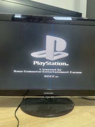 Sony Playstation Gris con mandos