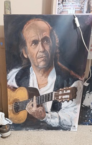 Cuadro al óleo retrato guitarrista