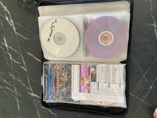 PlayStation 2 (PS2) Nera con accessori e giochi