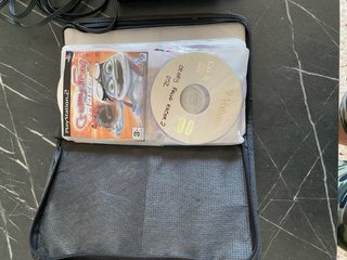 PlayStation 2 (PS2) Nera con accessori e giochi