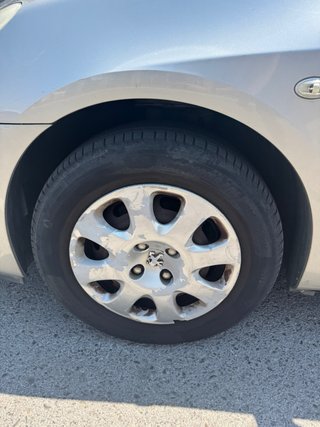 4 Llantas Hierro con Tapacubos Peugeot