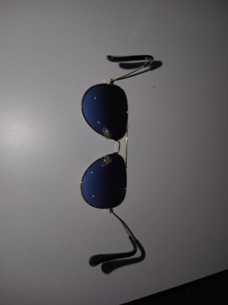 Gafas de sol Ray-Ban doradas y azules