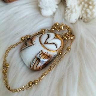 Collana con ciondolo barbagianni dorato
