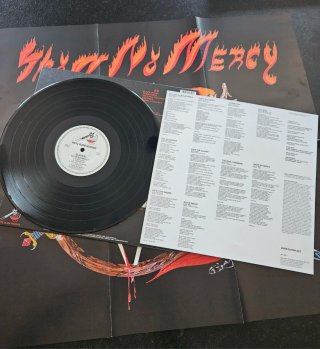 Slayer - Show No Mercy (Vinilo + Póster).