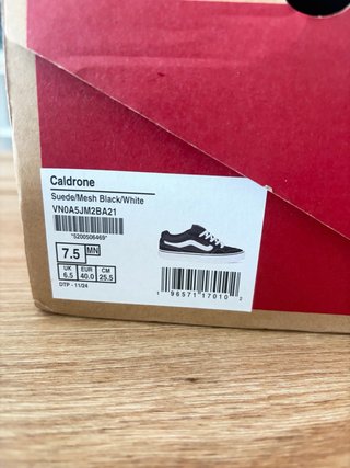 Zapatillas Vans Negras y Blancas