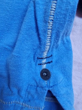 Polo Napapijri azul con banderas