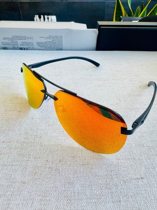 Gafas de sol tornasol naranjas y rojas