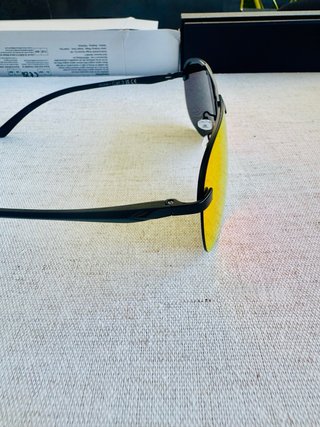 Gafas de sol tornasol naranjas y rojas