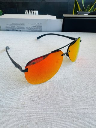 Gafas de sol tornasol naranjas y rojas