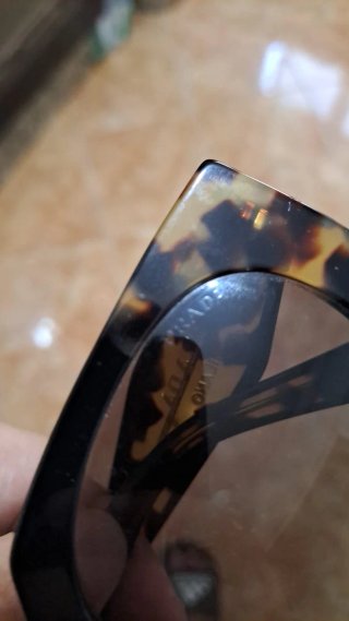 Gafas de sol de prada milano