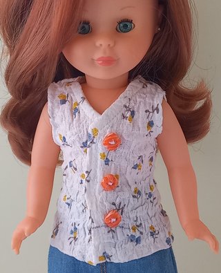 Blusa Nancy floral con botones naranjas