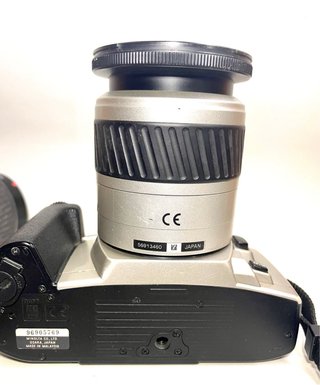 Minolta ST SI Maxxum con dos objetivos