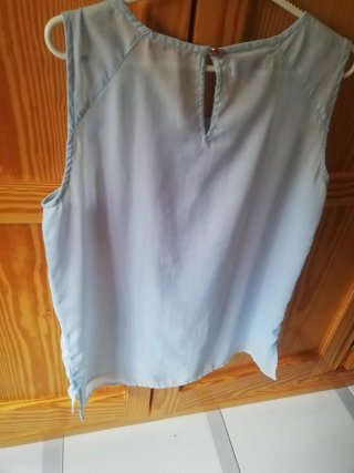 Blusa sin mangas azul Blanco