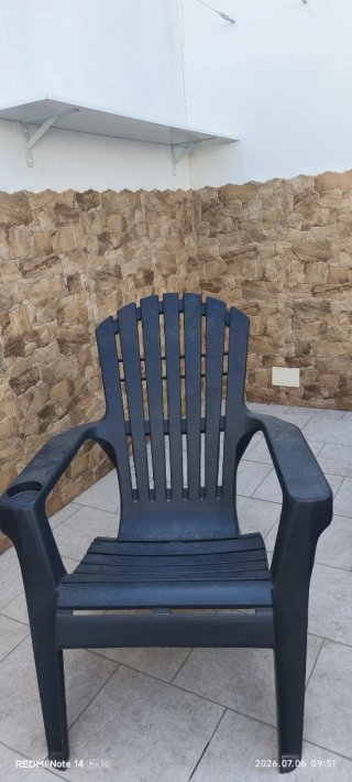 Un sillón de PVC de jardín