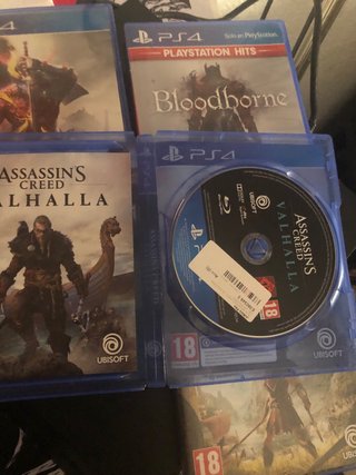 Consola PS4 Negra + Juegos y Accesorios