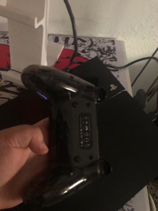 Consola PS4 Negra + Juegos y Accesorios