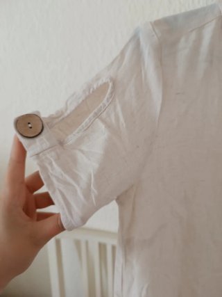 Camiseta beige manga corta botones