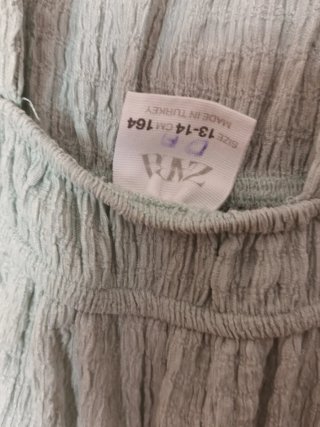 Mono verde de chica talla 13-14