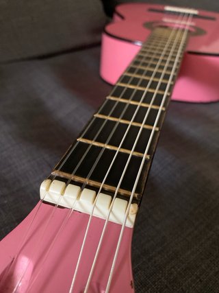Guitarra infantil rosa