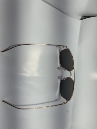 Gafas de sol Sting negras y doradas