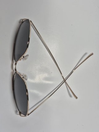 Gafas de sol Sting negras y doradas