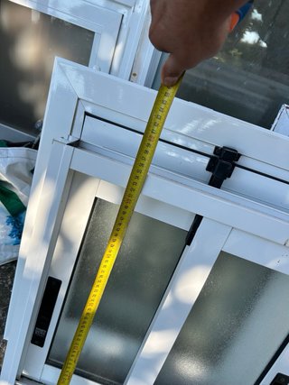 Ventana corredera con envellembellecedor