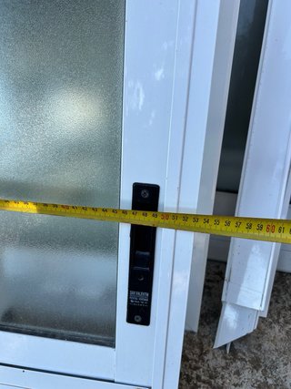 Ventana corredera con envellembellecedor