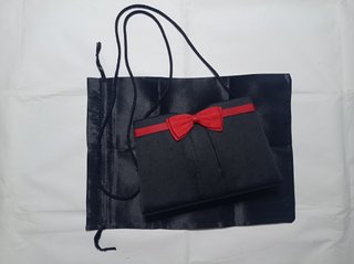 Bolso de noche Balenciaga negro y dorado
