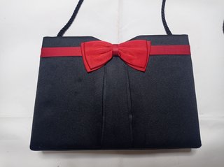 Bolso de noche Balenciaga negro y dorado