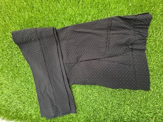 Pantalón pitillo Zara negro estampado
