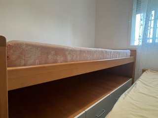 Cama nido de madera.