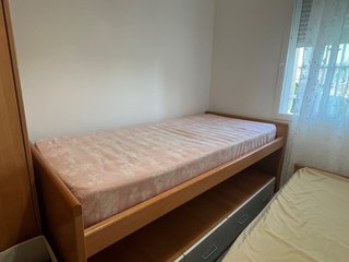 Cama nido de madera.