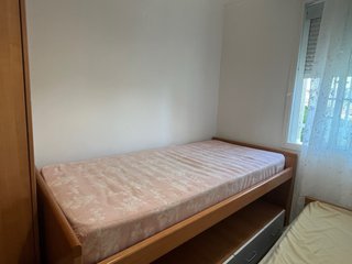Cama nido de madera.