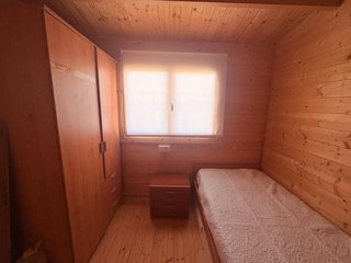 Casa de madera con piscina