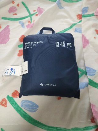 Chubasquero Quechua MH100 Azul 13-15 años