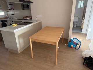 Mesa de comedor extensible de madera